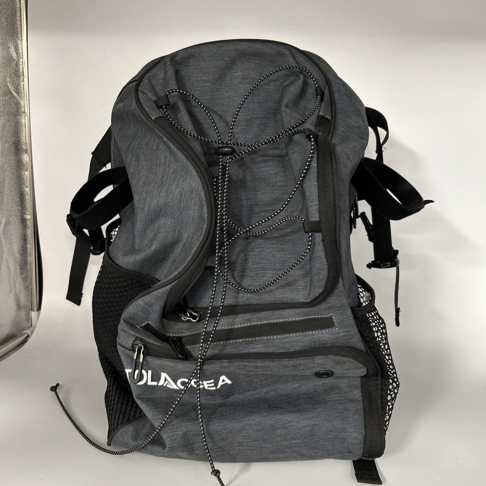 dark gray Tolaccea sports backpack with a bungee cord system on the front